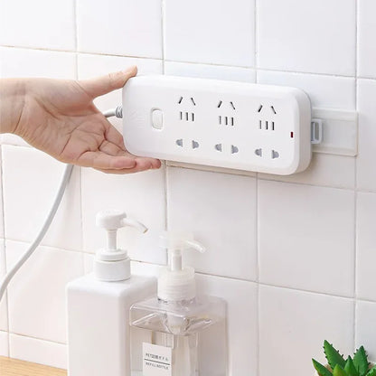 Selbstklebender Desktop-Sockel-Fixer Kabel Organizer Wandhanging Stromstreifenhalter Fixier-Plug-In entfernbare Wandmontierte Fixer